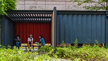 The industrial container was split into transitional, secluded spaces between indoor and outdoor environments which visitors can wind down and socialise.